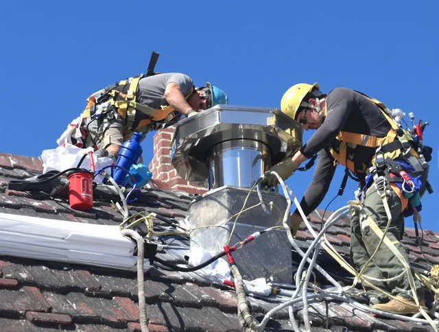 Protective chimney cap installed by Warrensville Heights Chimney Sweep in Warrensville Heights, OH