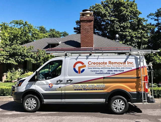 Warrensville Heights Chimney Sweep technician removing creosote safely in Warrensville Heights, OH