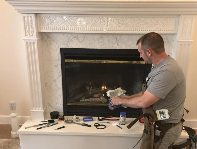 Warrensville Heights Chimney Sweep performing fireplace maintenance in Warrensville Heights, OH